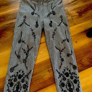 CAPRI BLACK AND WHITE CHECK WITH SOME RED BEADING. SIZE SMALL